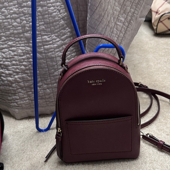 kate spade mini red backpack New York Duo Shoulder Bag Front signature emblem logo plaque with floating spade Gracie Mini Bag | Kate